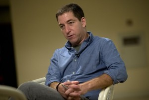 Journalist Glenn Greenwald speaks during an interview with the Associated Press in Rio de Janeiro, Brazil, Sunday, July 14, 2013.  Greenwald, The Guardian journalist who first reported Edward Snowden's disclosures of U.S. surveillance programs says the former National Security Agency analyst has "very specific blueprints of how the NSA do what they do."(AP Photo/Silvia Izquierdo)